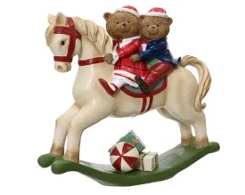 Christmas rocking horse with teddies